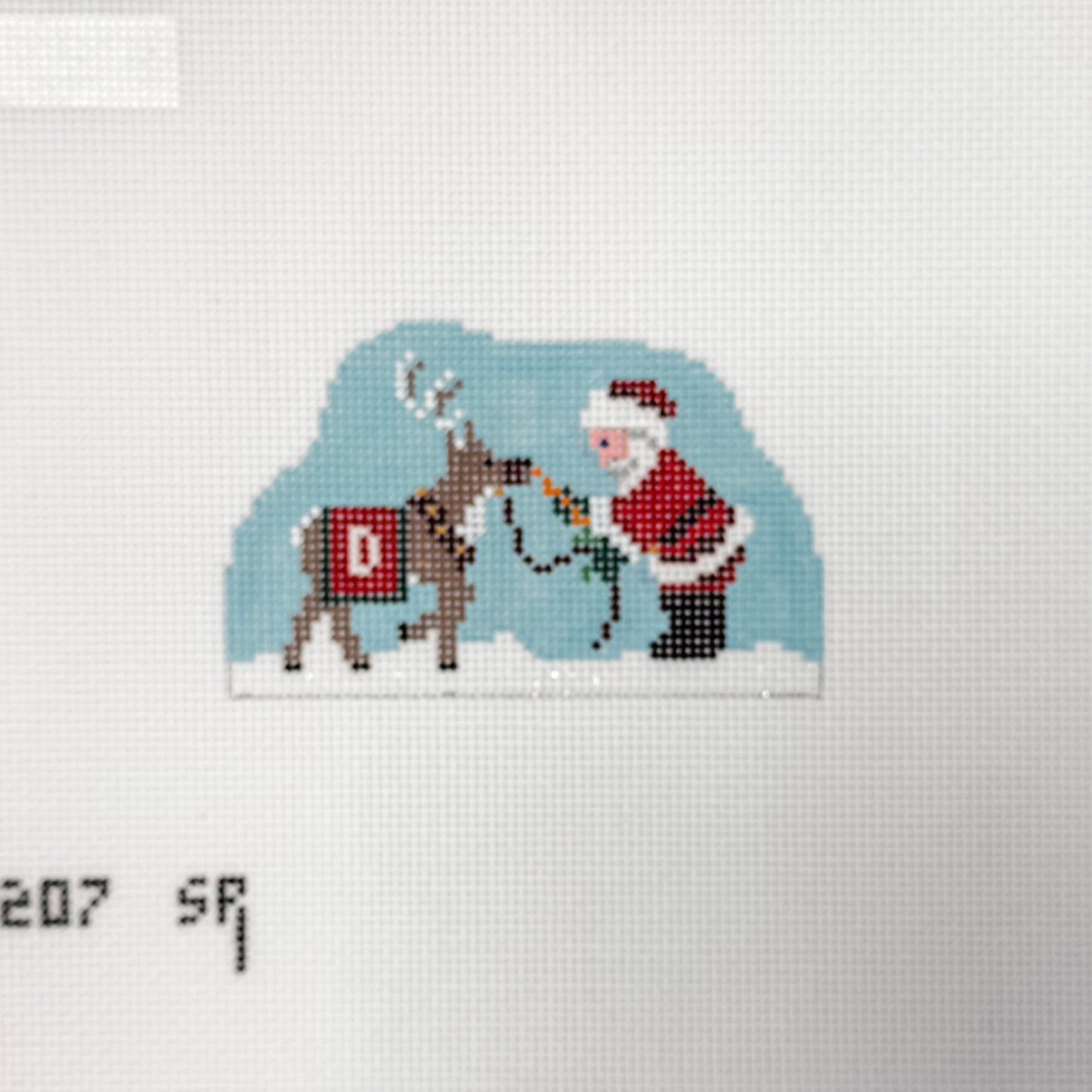Susan Roberts Santa’s Village Santa Feeding Reindeer