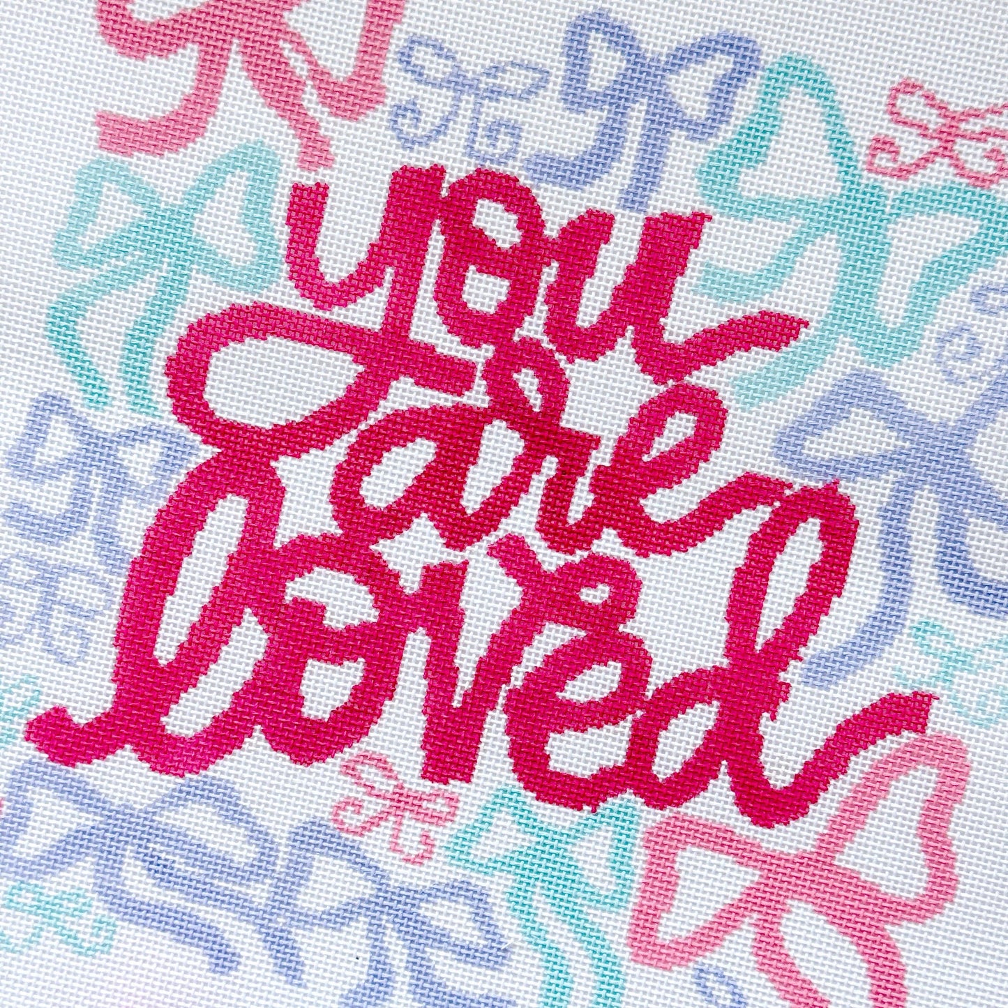 You Are Loved Needlepoint Canvas – 18 Mesh Zweigart Mono Deluxe, 8x8.2" Design on 12x12.2" Hand-Painted Pastel Bow Quote